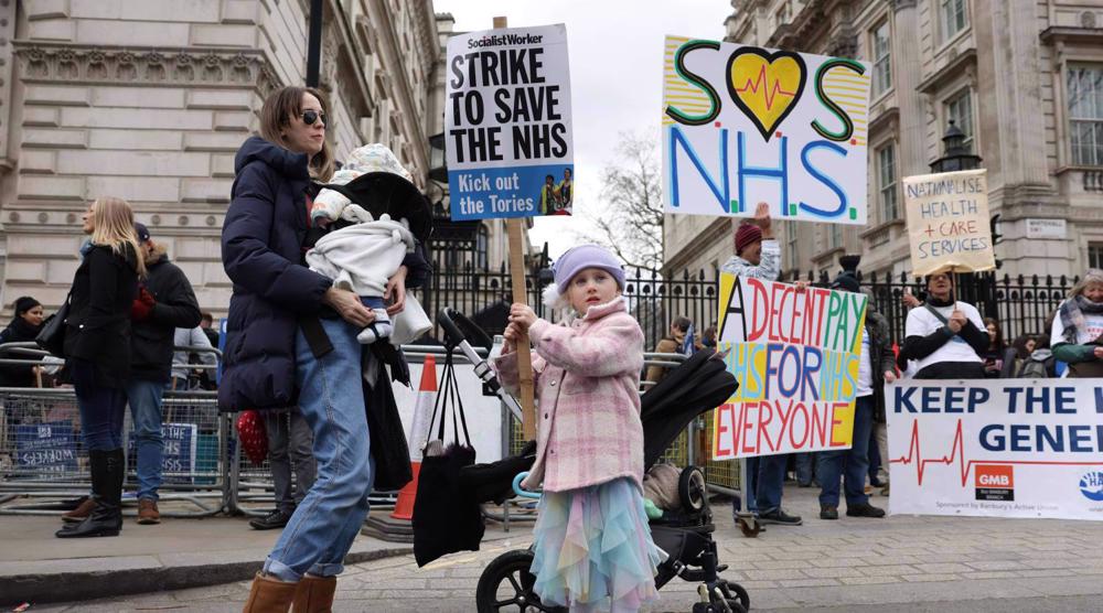 Protesters in London support health workers as doctors prepare to go on strike