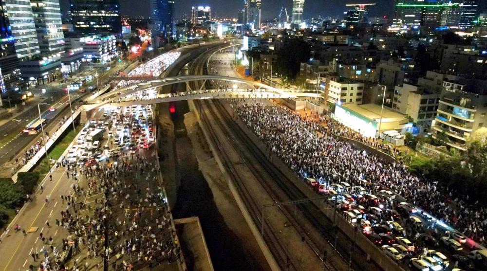 Israel's thousands-strong protests continue as Netanyahu fires minister