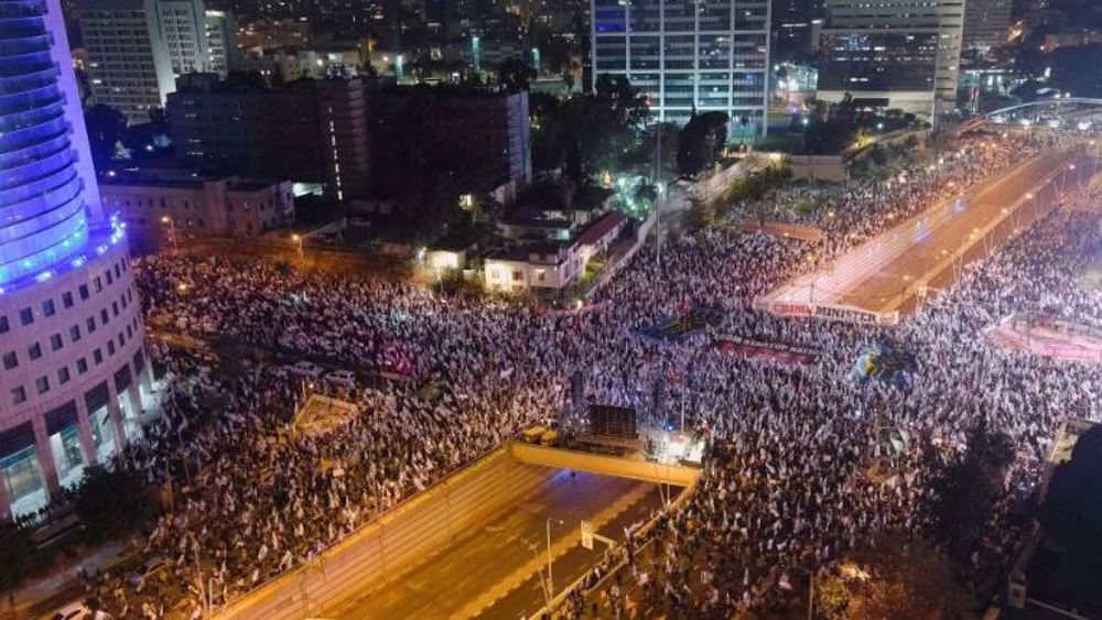 Tens of thousands rally across occupied territories against Israel's 'crime minister' for 9th straight week