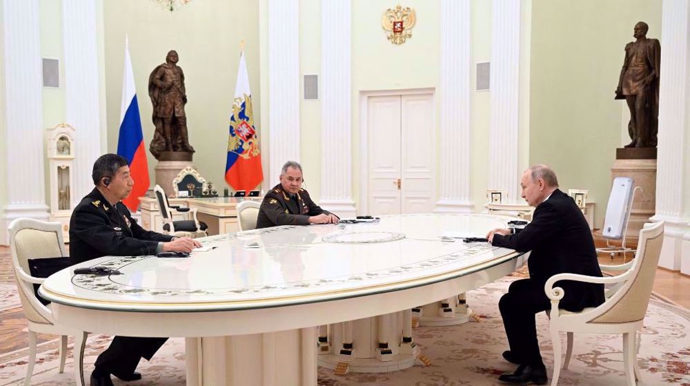 Poutine salue la coopération militaire Moscou-Pékin