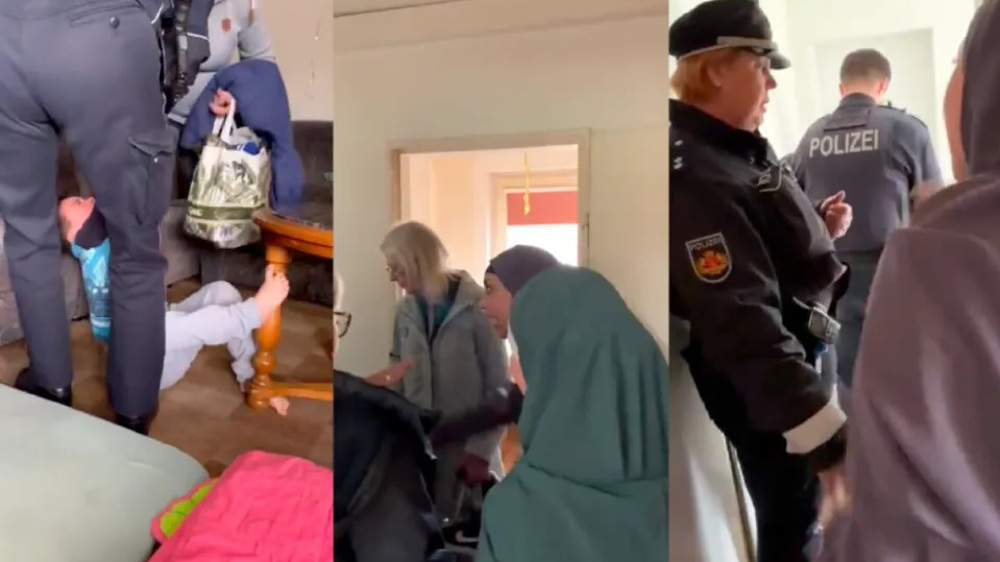 German police take away screaming child over Muslim parents' teachings 