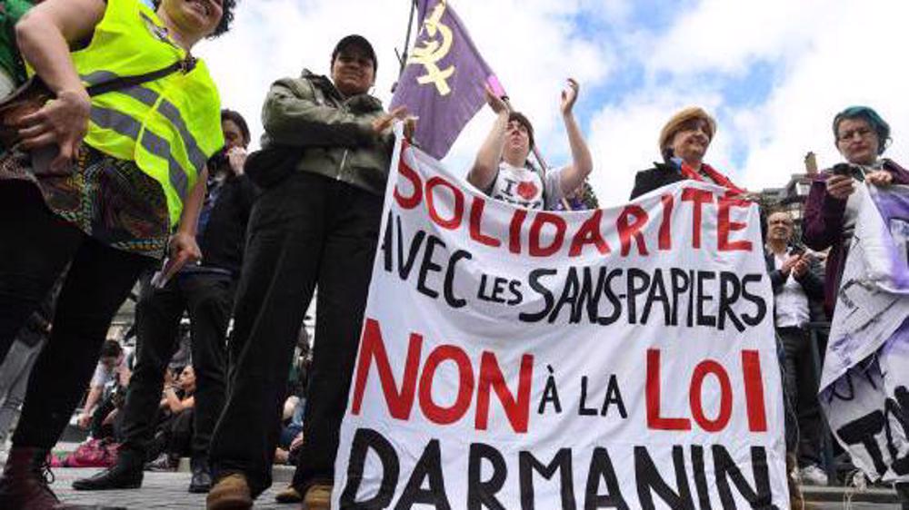 Thousands of French demonstrators protest government's immigration plans