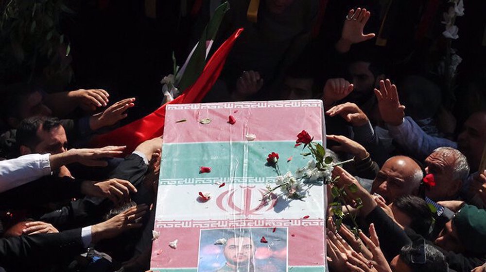 Iranians bid farewell to IRGC military advisors martyred in Syria