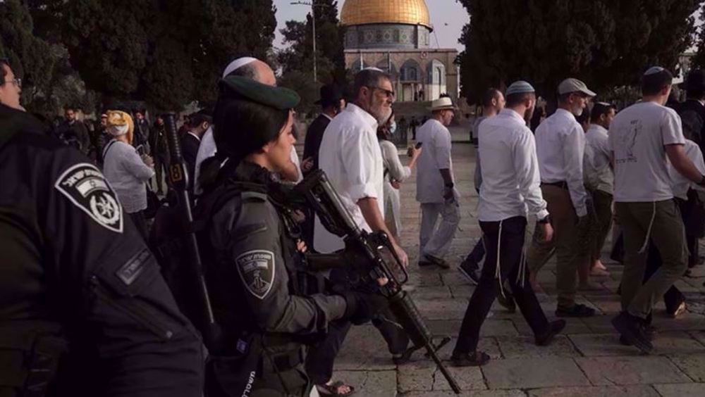 Guarded by occupation forces, Israeli settlers storm al-Aqsa Mosque again