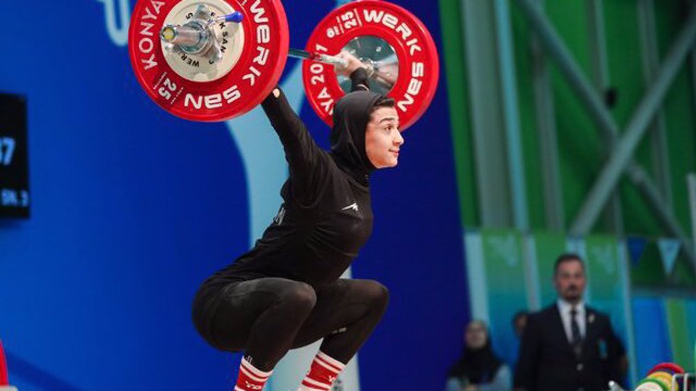 Female Iranian weightlifter grabs two bronze medals in Asian championships