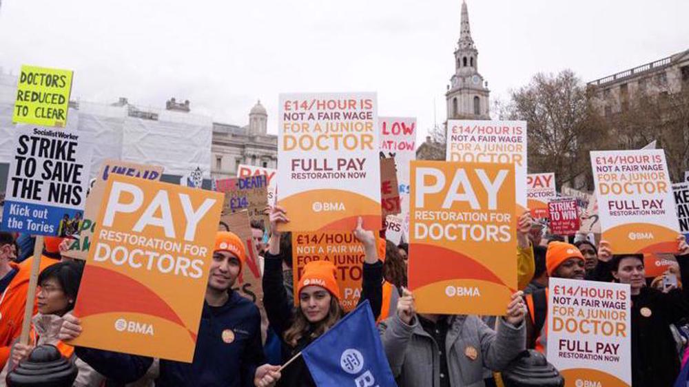 Senior doctors in England vote to go on strike over pay dispute with govt.