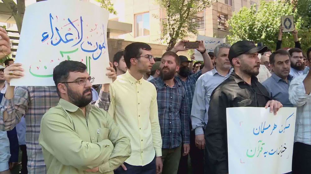 Protesters set Swedish flag ablaze in Tehran over Qur'an desecration