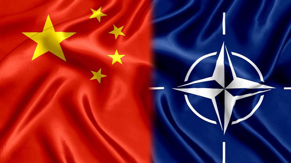China opposes eastward drive by NATO 