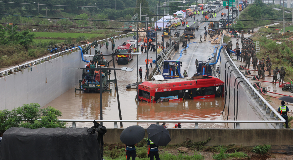 South Korea flooding: Death toll rises as rescuers retrieve bodies