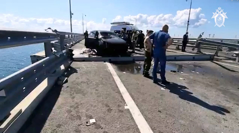 Ukraine drone attack in Crimea prompts mass evacuation, brief bridge closure