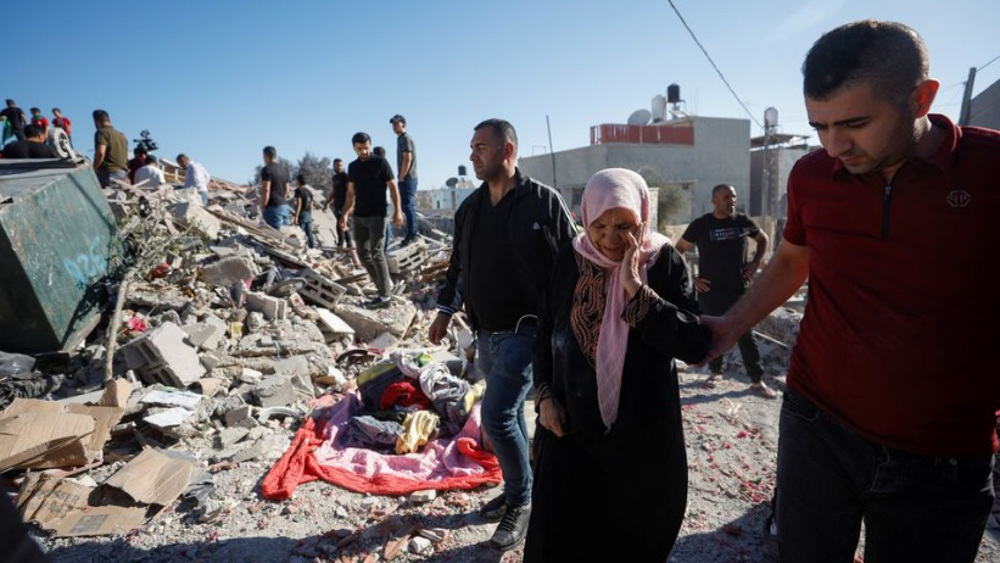 Palestinian man forced to demolish own home in occupied al-Quds