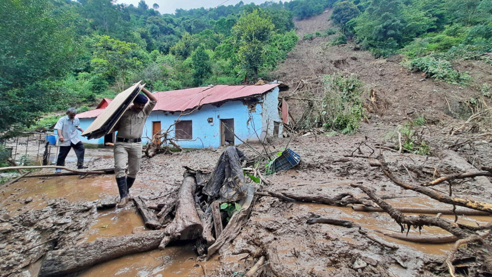 Search for survivors after Indian floods, landslides kill 65