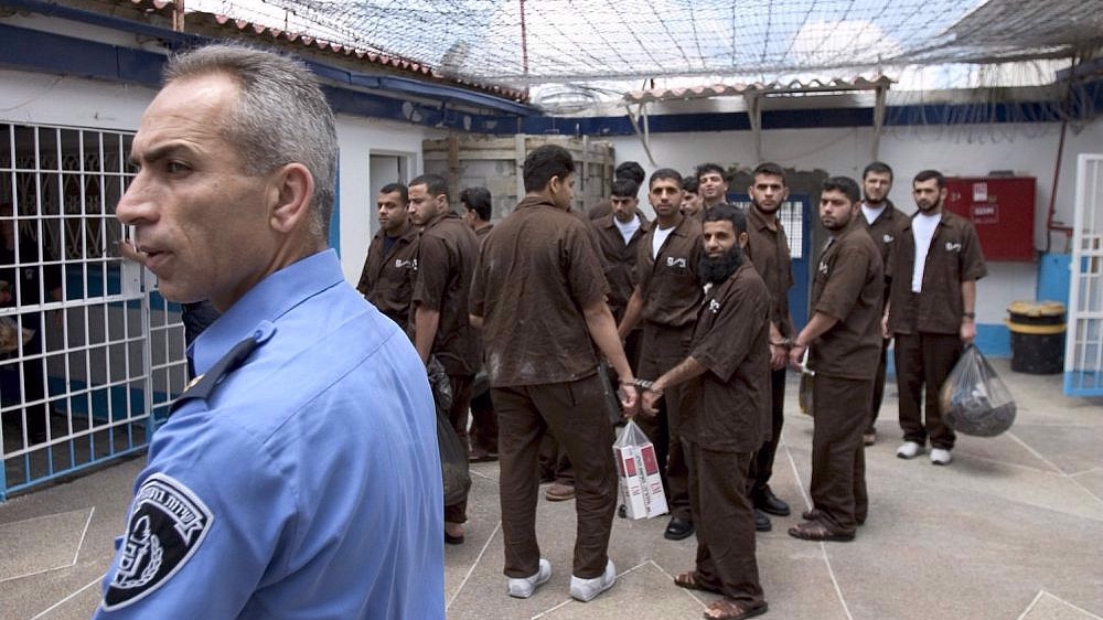 Hundreds of Palestinian prisoners go on hunger strike over Israeli jail raids