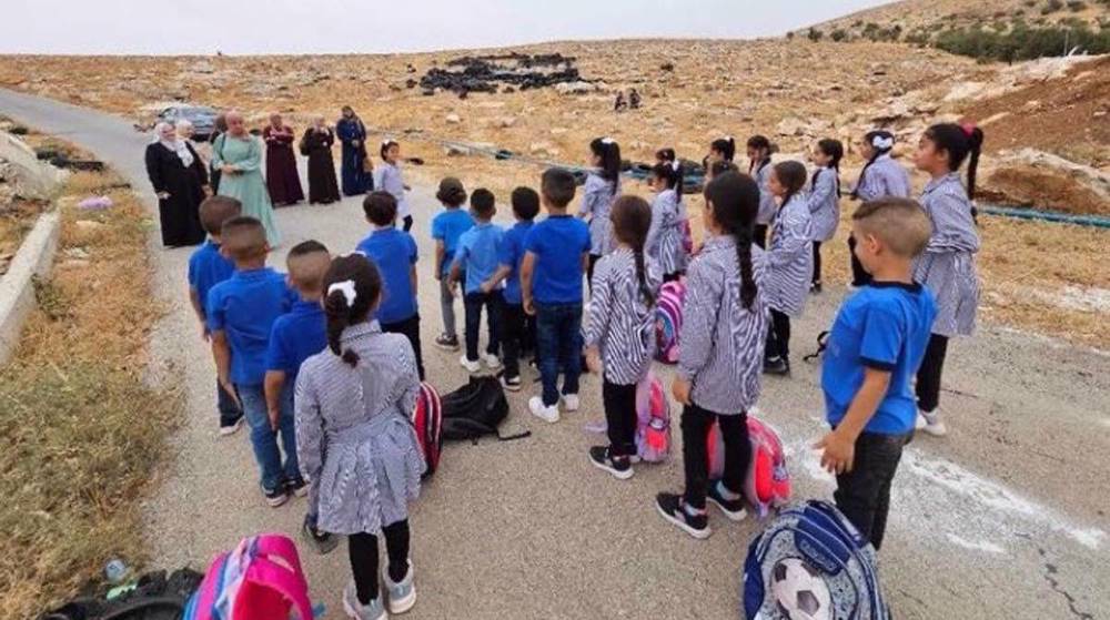 Palestinian students begin school in open air due to Israeli demolition