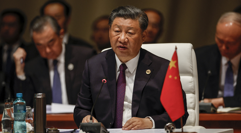 President of China Xi Jinping attends the plenary session during the 2023 BRICS Summit at the Sandto