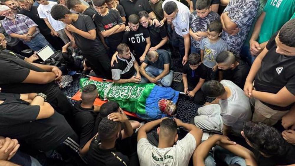 Palestinians hold funeral of two killed by Israel in West Bank
