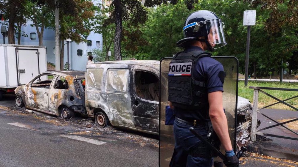 French teenager dies after collision with police vehicle, govt. fears further riots