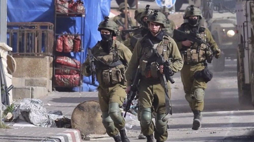 Israeli forces kill 5 Palestinians, including 3 teens, in violent raids across West Bank