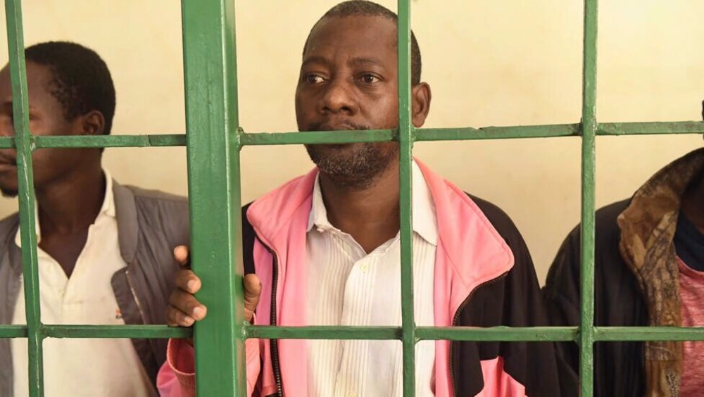 Kenyan priest charged with murder after discovery of mass graves