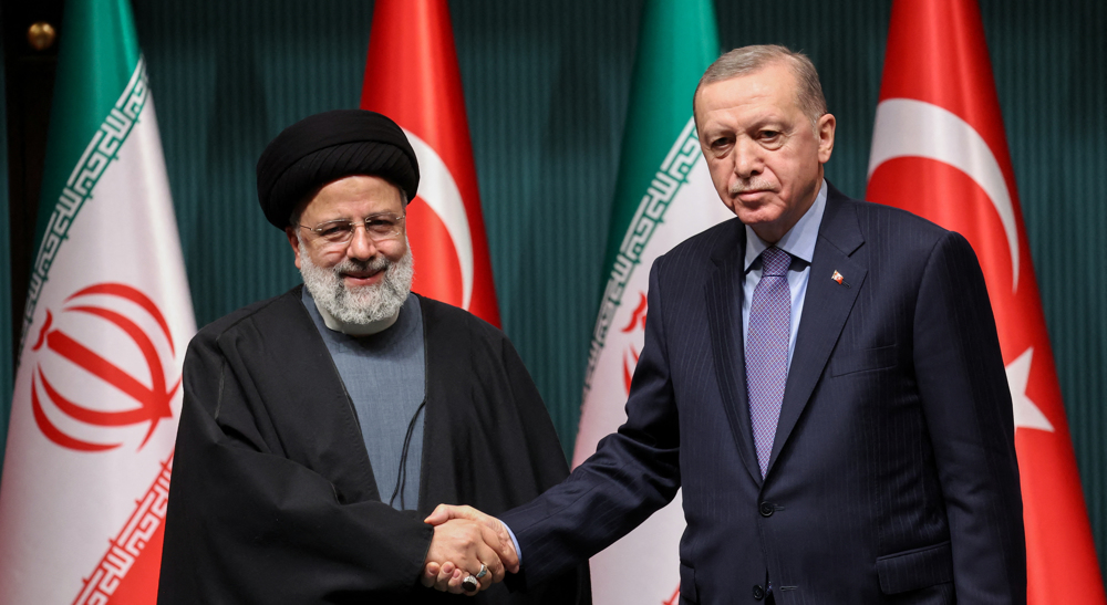 Iran, Turkey agree to develop free trade zone on joint border