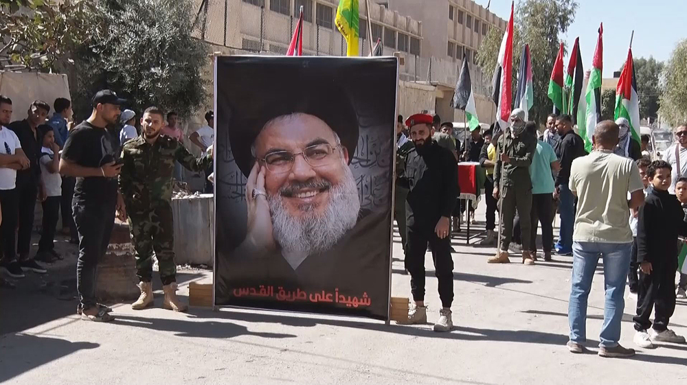 Syrians, Palestinians pay tribute to martyr Nasrallah