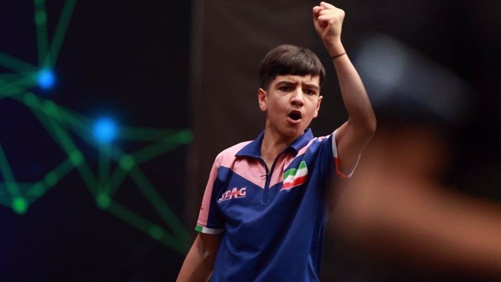 14-year-old Iranian table tennis player makes history by beating world number one