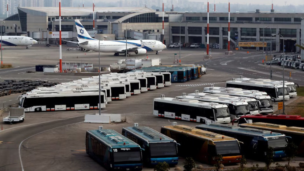 Passenger traffic at main Israeli airport drops 43% amid raging conflict