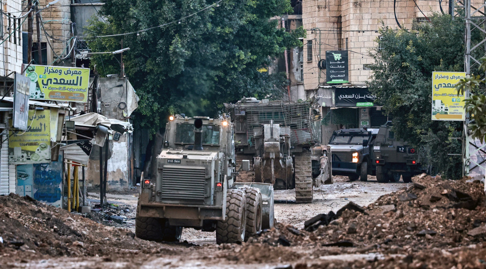 Israeli forces intensify raids, demolition campaign in West Bank amid clashes 