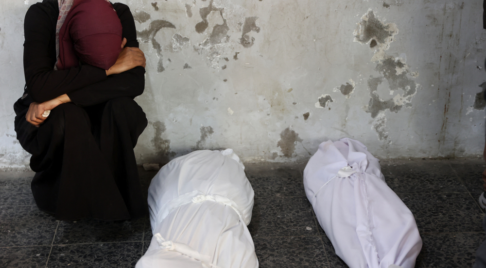 Israel kills scores of Palestinians, including aid workers, in Gaza
