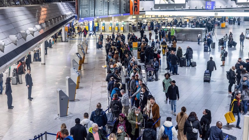Tens of thousands striking airport security staff ground flights across  Germany
