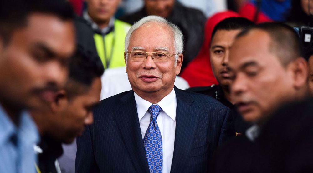 Malaysia halves jail term of former Prime Minister Razak in 1MDB scandal