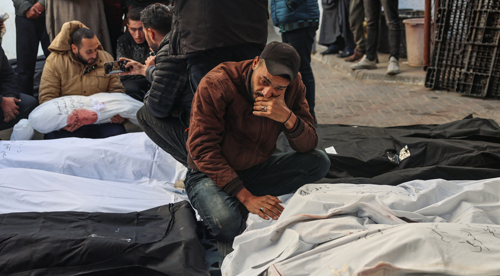 Palestinians bid adieu to their loved ones in tear and pain