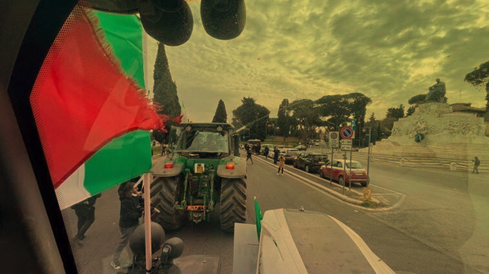 Italian farmers protesting against EU policies drive tractors into Rome