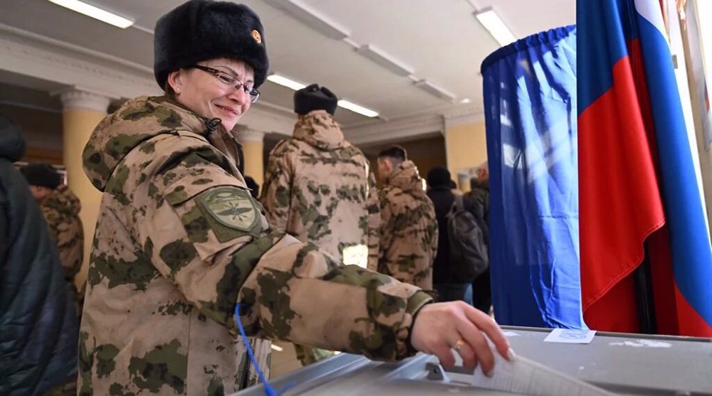 Russians vote in presidential election amid escalating border attacks