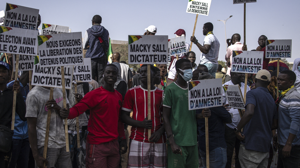 Hundreds protest in Senegal to demand speedy elections