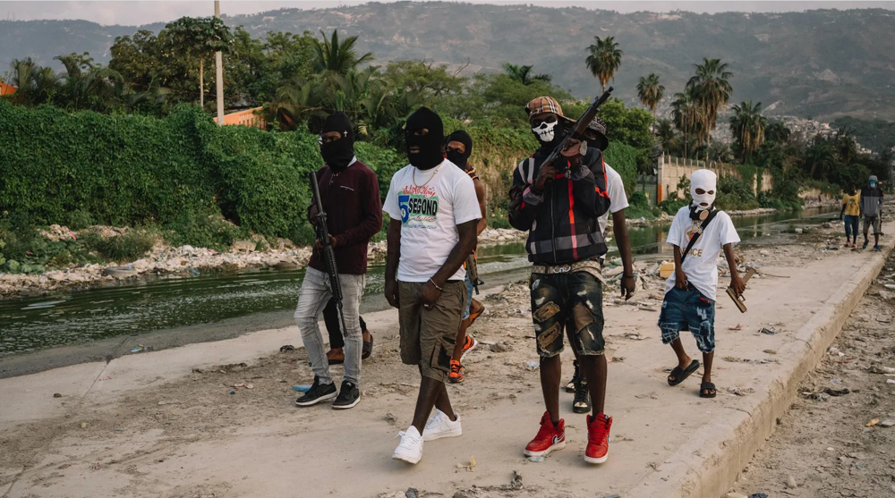 Gangs advance in Haitian capital as interim govt. talks drag on
