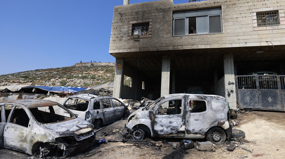 Israeli settlers continue raids into West Bank, setting homes, cars ablaze