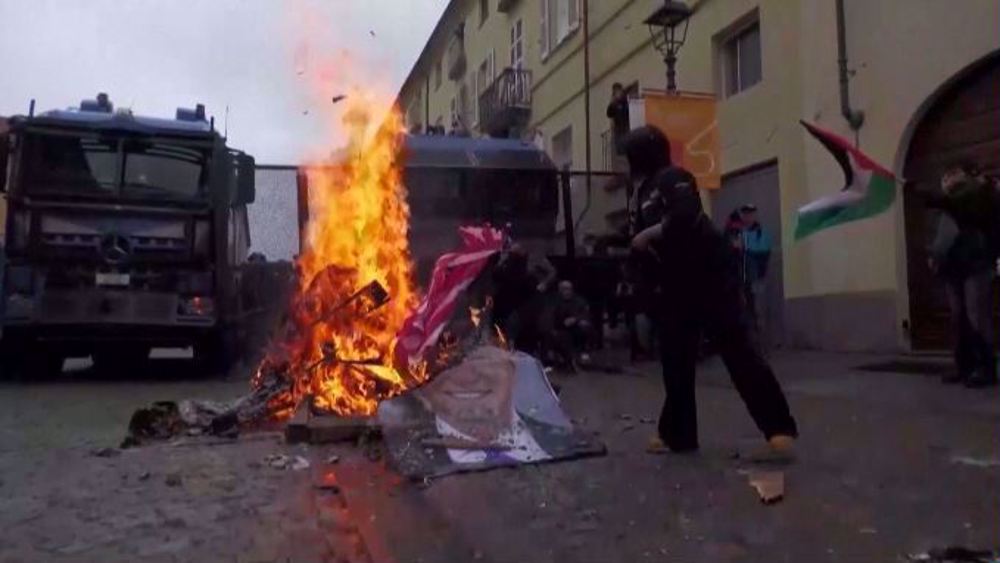 Protesters burn photos of G7 leaders ahead of energy meeting in Italy