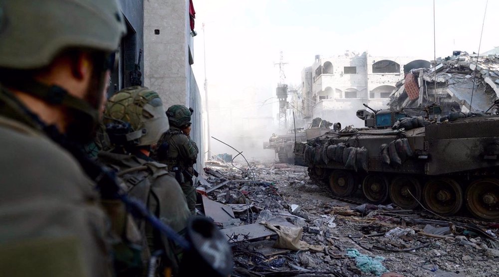 14 Israeli troopers killed, wounded in resistance operation in central Gaza