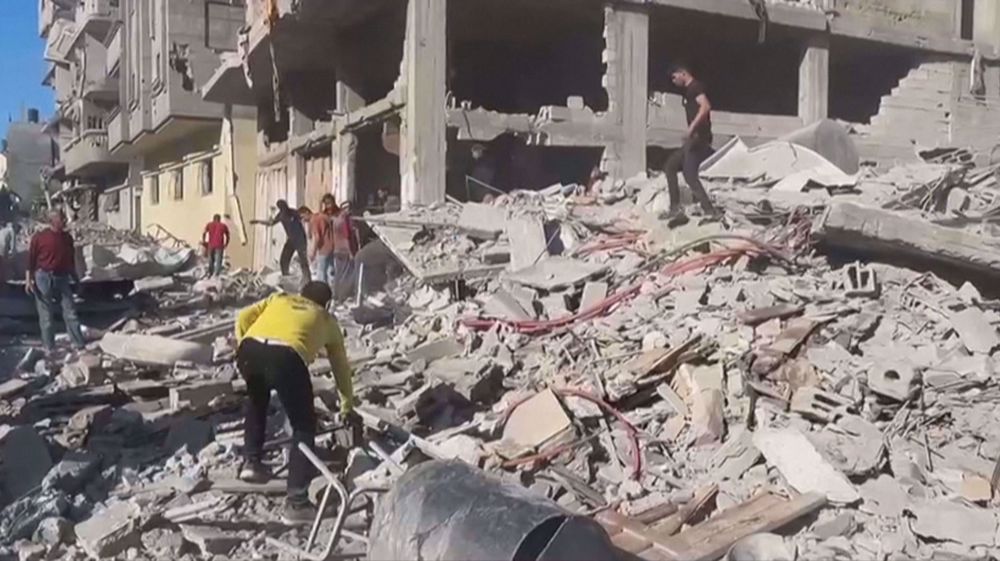 Gazans search rubble for survivors after Israeli strikes on Jabalia