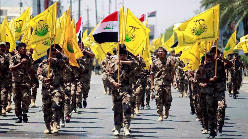  Members of the Iraqi Harakat Hezbollah al-Nujaba anti-terror resistance groups are seen during a mi