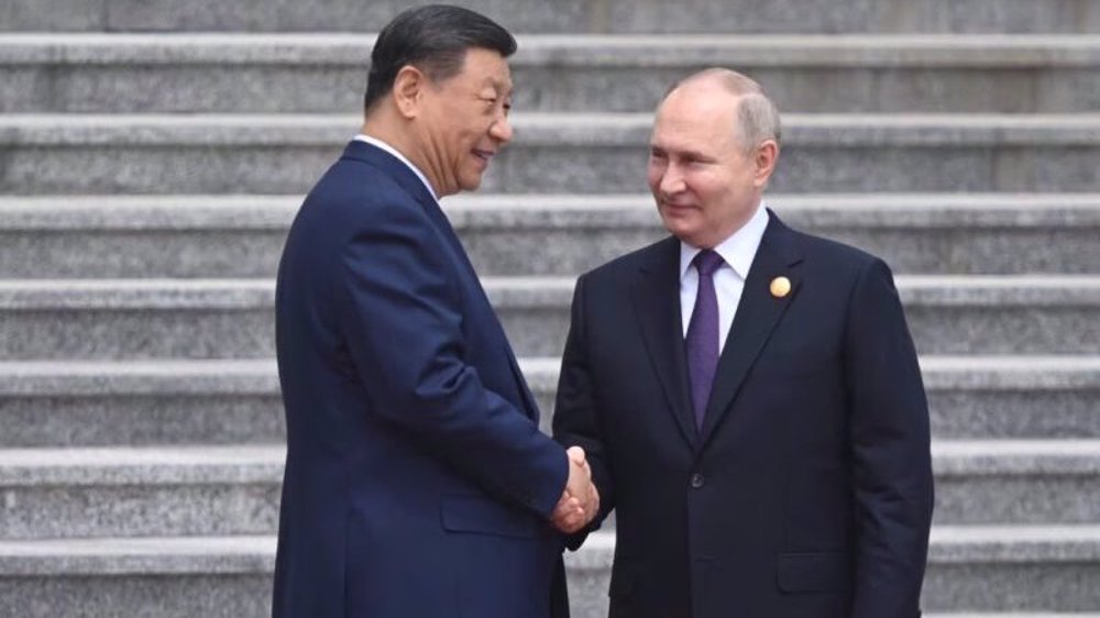 Putin in Beijing: Russia, China agree to deepen ‘strategic partnership’  