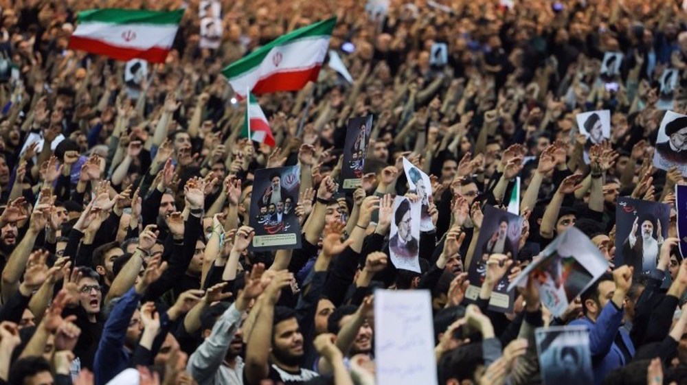 Millions of mourners gather in Tehran for Raeisi funeral 