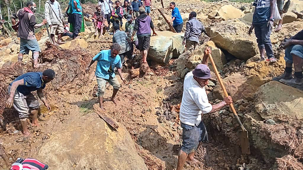Villagers search for survivors at site of deadly Papua New Guinea landslide