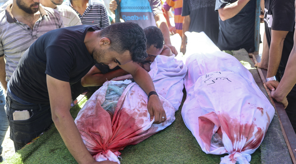 Hamas chief's sister among dozens killed in Israeli strikes on Gaza  