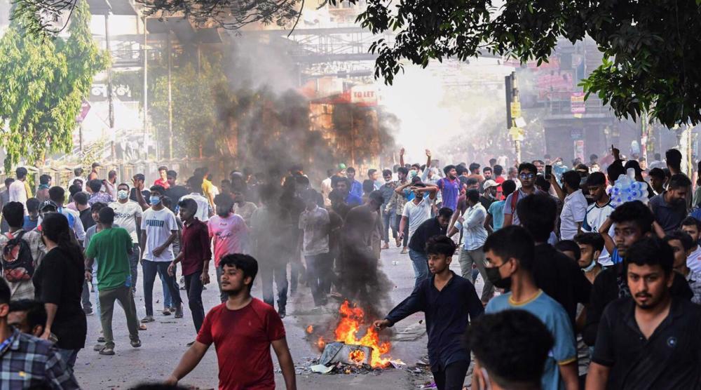 At least 32 killed in Bangladesh as protesters torch state broadcaster