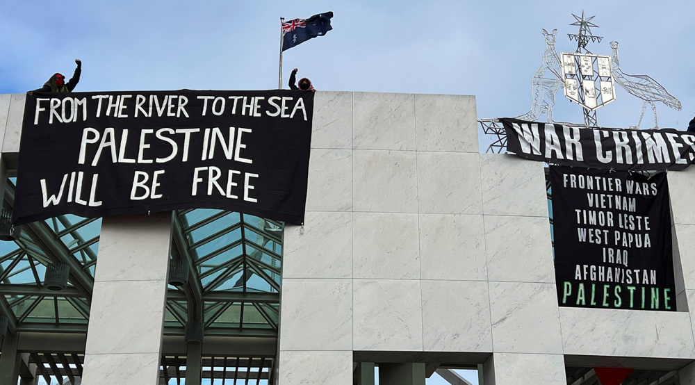 Pro-Palestine protesters raise anti-Israel banners on Australia’s parliament roof