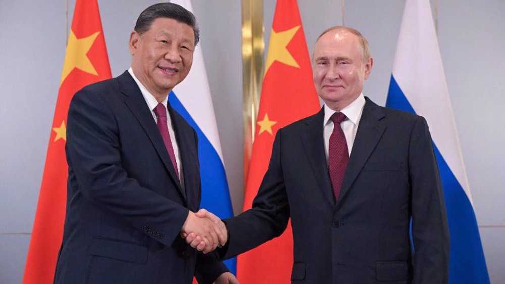 Putin, Xi urge boosted cooperation among Eurasian nations to challenge US