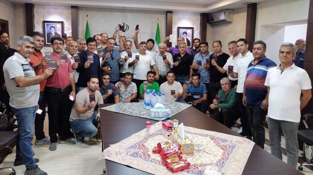 In Pictures: Iranians overseas vote in presidential runoff election with patriotic fervor