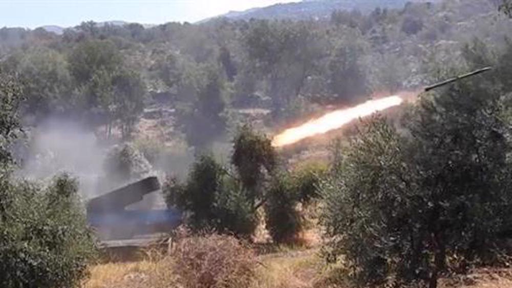 Hezbollah fires dozens of rockets at Israeli strategic base 